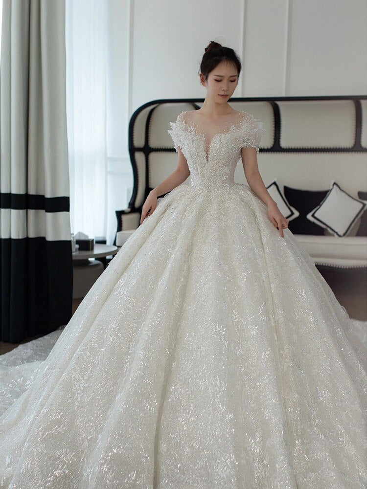 Elegante Abito da Sposa con Spalle Scoperte 2023 - Nuova Collezione: Abito da Sposa Principesco in Tulle con Perline e Perle