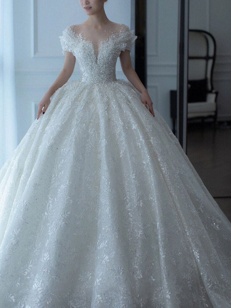 Elegante Abito da Sposa con Spalle Scoperte 2023 - Nuova Collezione: Abito da Sposa Principesco in Tulle con Perline e Perle