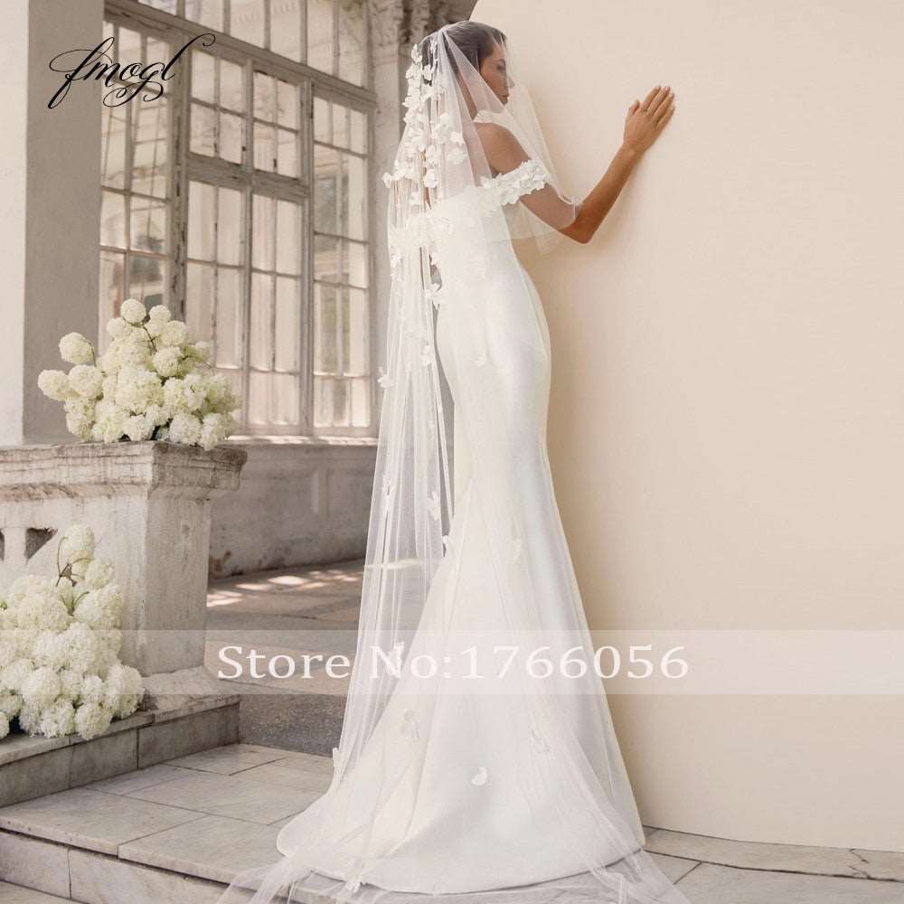 Abito da sposa 2023 Sexy Mermaid con scollo a barca e dettaglio off-the-shoulder - Bridetobe.it