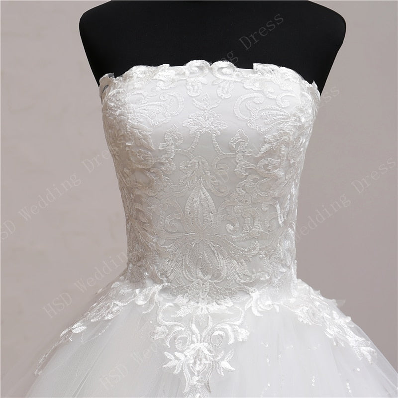 Abito da sposa senza maniche con spalle scoperte, pizzo ricamato e senza spalline - Bridetobe.it