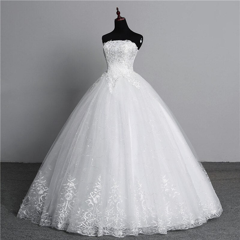 Abito da sposa elegante con gonna senza spalline e senza maniche con ricami in pizzo - Bridetobe.it