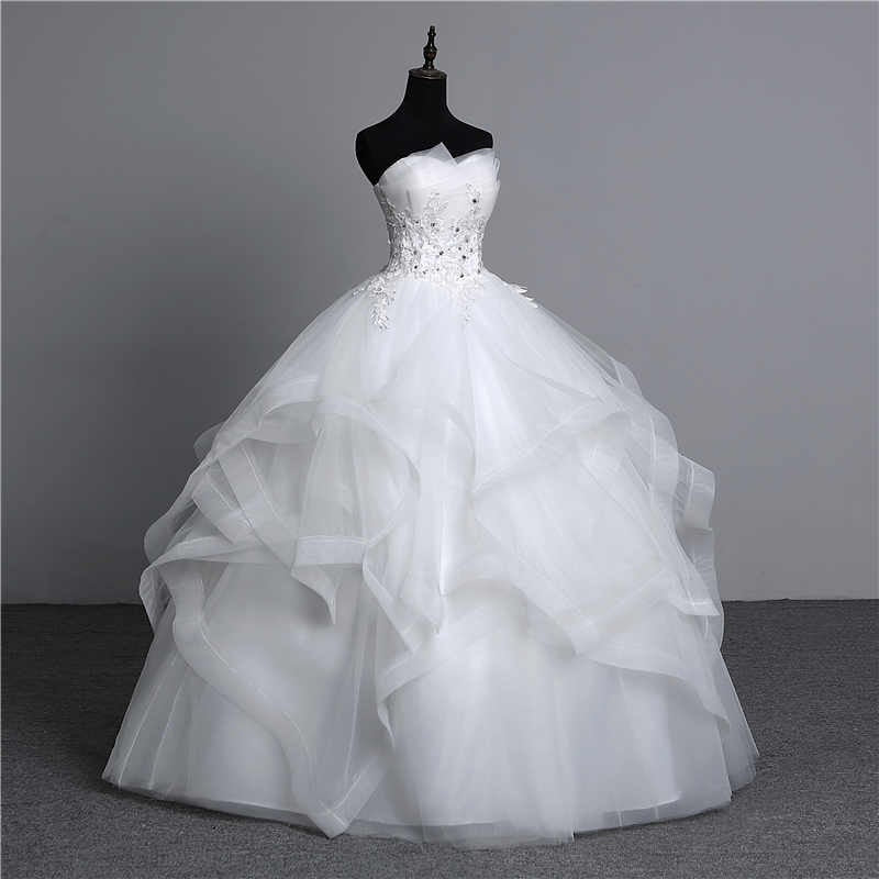 Abito da Sposa di Lusso in Pizzo Nero, Blu e Champagne con Drappeggio e Cristalli - Bridetobe.it