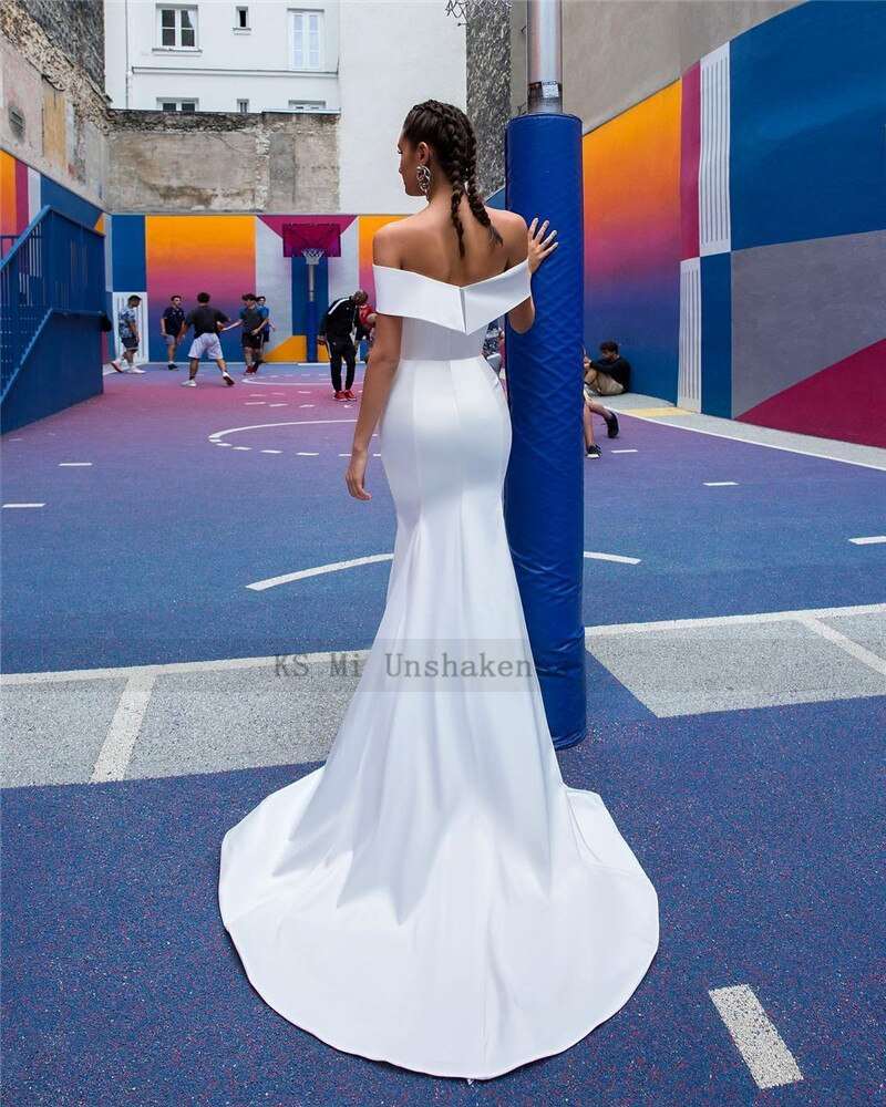 Abito da sposa di lusso 2023 in tulle a pois con gonna a sirena staccabile e ruches - Bridetobe.it