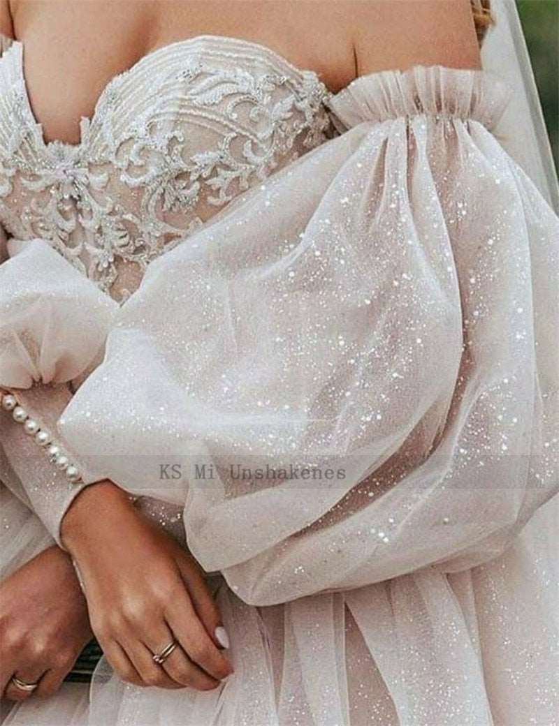 Abito da sposa boho 2023 rosa sporco con maniche a sbuffo staccabili e pizzo scintillante - Bridetobe.it