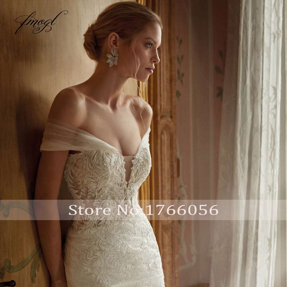 Abito da sposa a sirena di lusso con scollo a barca sexy, schiena scoperta in pizzo e applicazioni di perline - Bridetobe.it