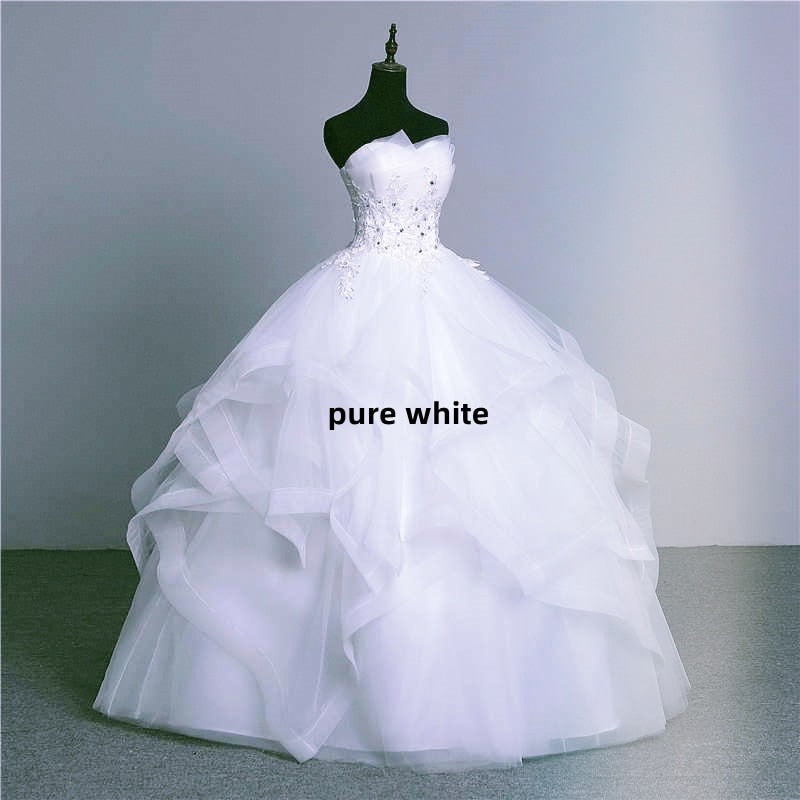 Abito da sposa elegante senza spalline con applicazioni di perle e cristalli di pizzo - Bridetobe.it