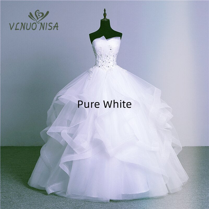 Abito da Sposa di Lusso in Pizzo Nero, Blu e Champagne con Drappeggio e Cristalli - Bridetobe.it
