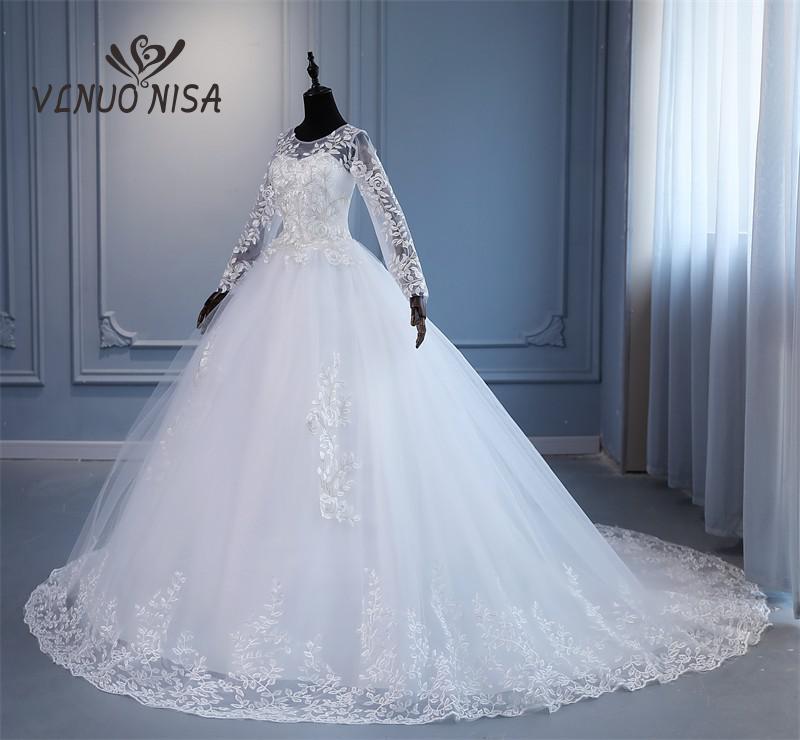 Abito da sposa a maniche lunghe con stampa floreale - Bridetobe.it