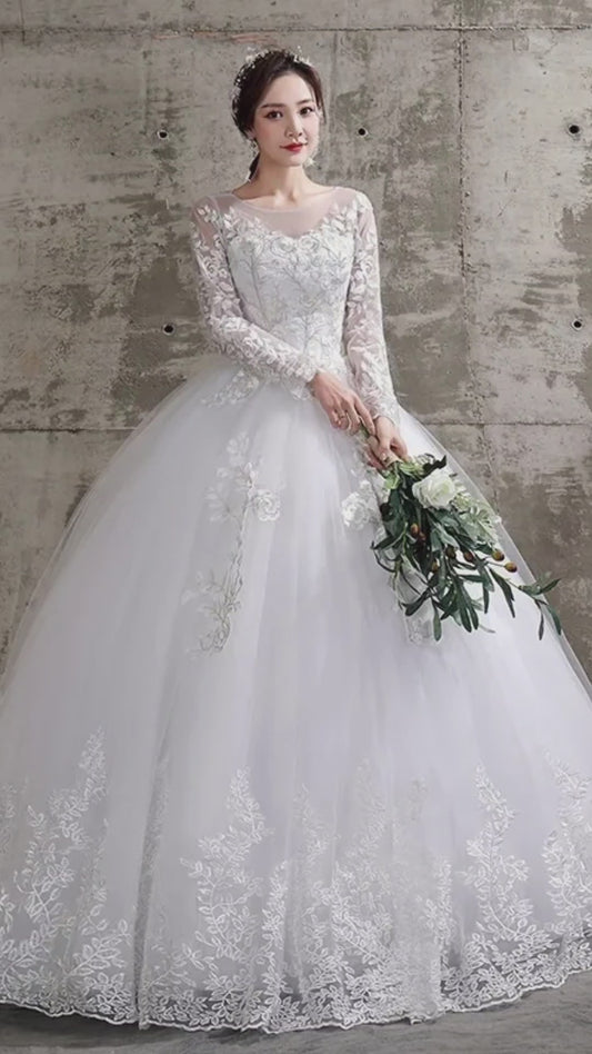 Ivory wedding dress with O-neck, long sleeves and lace appliques