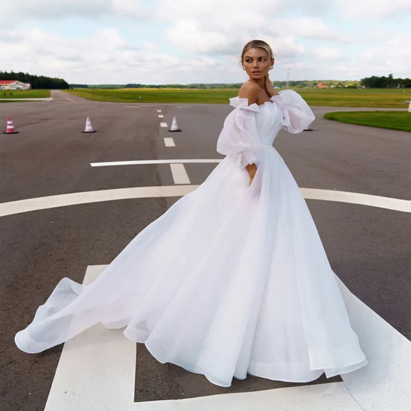 Abito da sposa Boho a maniche lunghe con pieghe per la primavera 2023 - Bridetobe.it