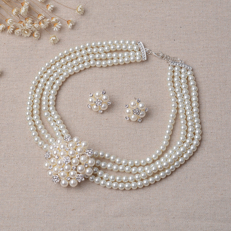 Set di accessori sposa in perle di lusso a forma di fiore e orecchini - Bridetobe.it