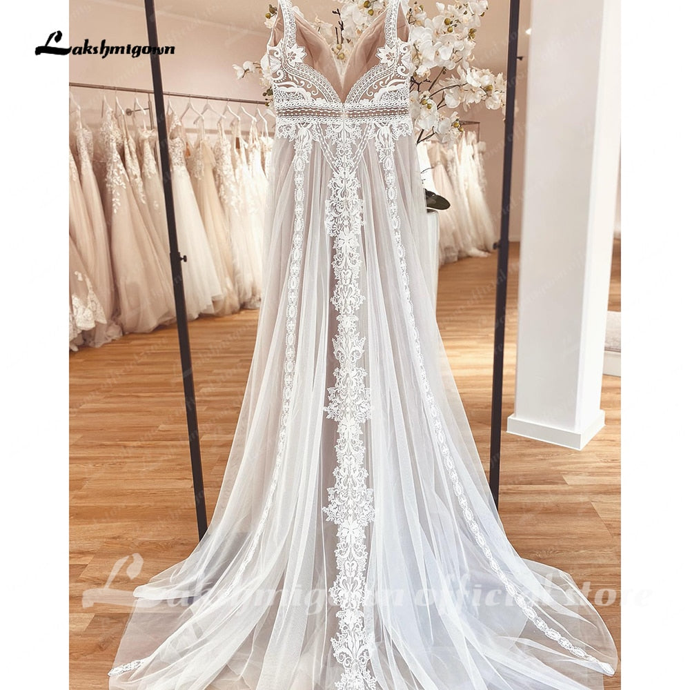 Abito da sposa senza maniche in stile bohemien con profondo scollo a V - Bridetobe.it