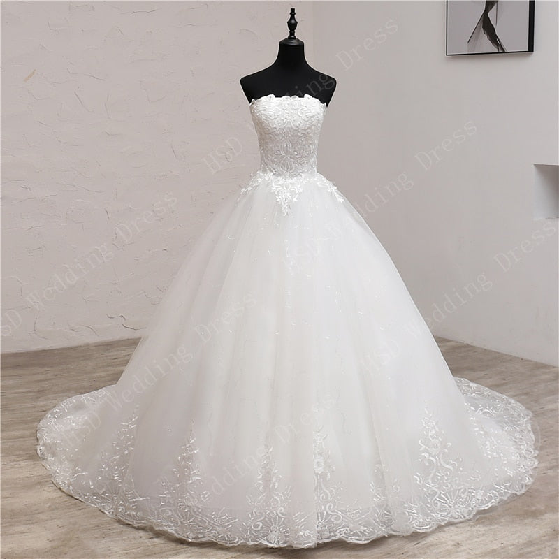 Sleeveless off the shoulder wedding dress with embroidered lace and  strapless