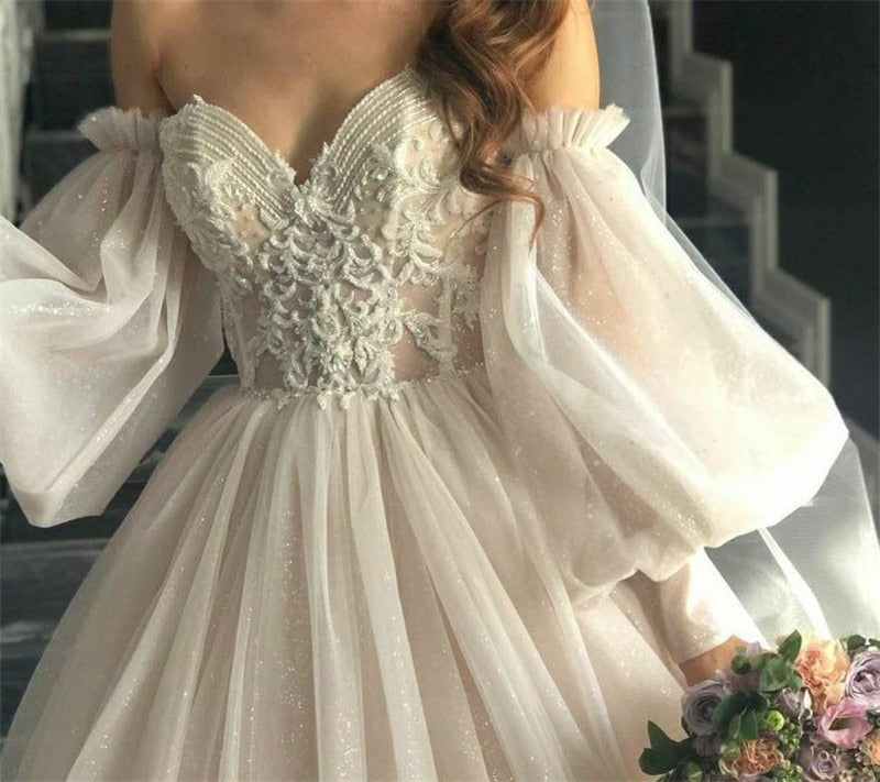 Abito da sposa boho 2023 rosa sporco con maniche a sbuffo staccabili e pizzo scintillante - Bridetobe.it