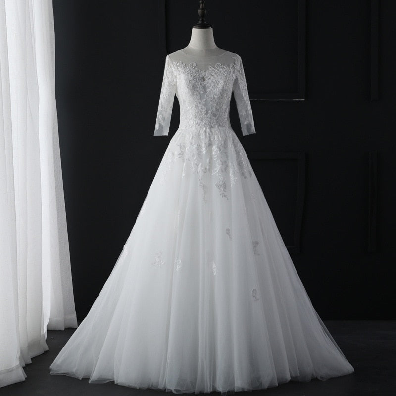 Abito da sposa elegante con pizzo a tre quarti di manica e scollo a O - Bridetobe.it