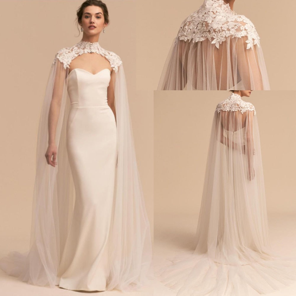 Giacca da sposa in tulle con applicazioni, collo alto e lunghezza cattedrale - Bridetobe.it