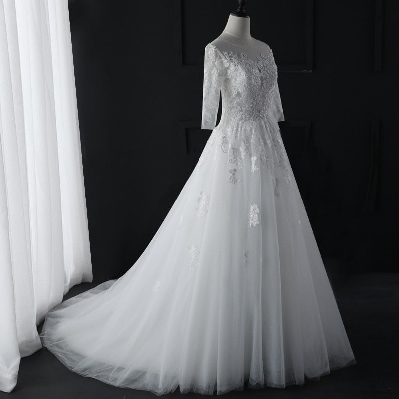 Abito da sposa elegante con pizzo a tre quarti di manica e scollo a O - Bridetobe.it