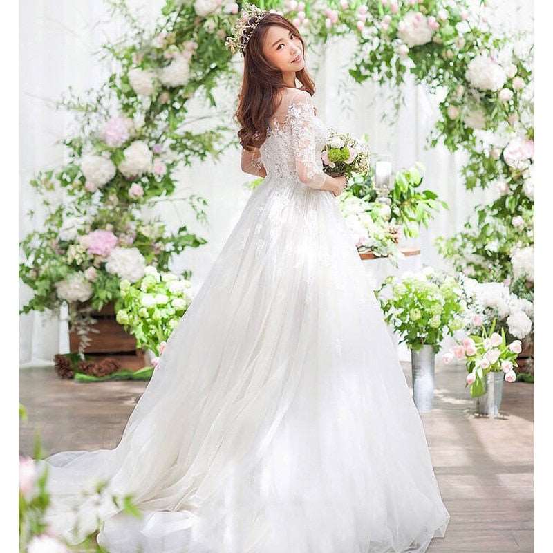 Abito da sposa elegante con pizzo a tre quarti di manica e scollo a O - Bridetobe.it