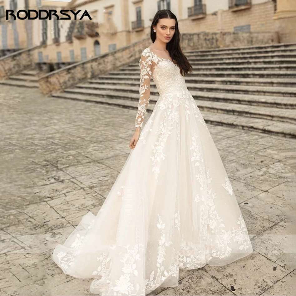 Abito da sposa elegante con collo a O, applicazioni in pizzo, maniche lunghe e linea A - Bridetobe.it