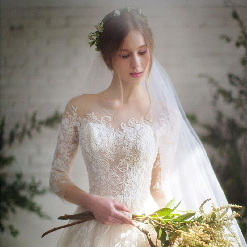 Abito da sposa elegante con pizzo a tre quarti di manica e scollo a O - Bridetobe.it