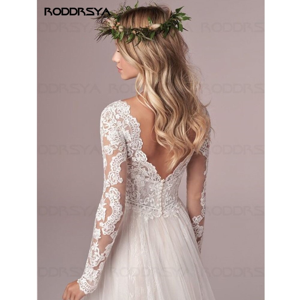 Abito da sposa in tulle con pizzo e maniche lunghe a linea A - Bridetobe.it