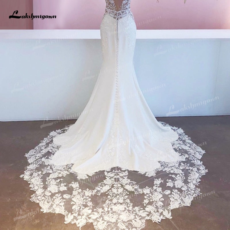 Abito da sposa in pizzo mermaid in stile boho chic del 2023, lussuoso ed elegante con applicazioni in pizzo e satin - Bridetobe.it