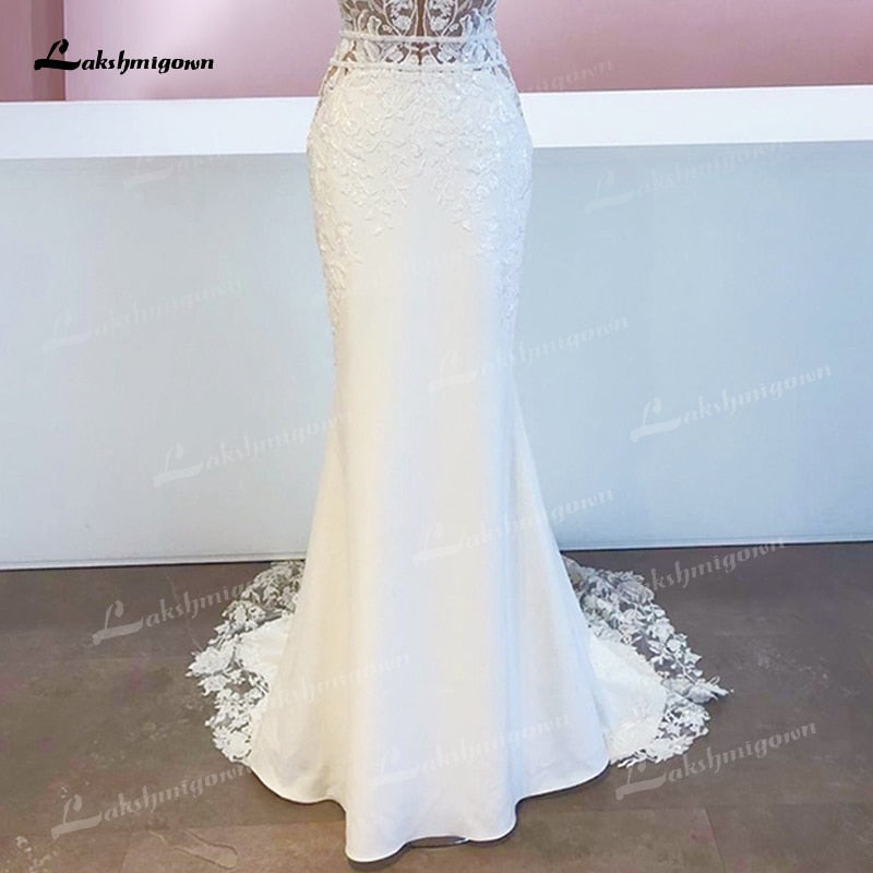 Abito da sposa in pizzo mermaid in stile boho chic del 2023, lussuoso ed elegante con applicazioni in pizzo e satin - Bridetobe.it