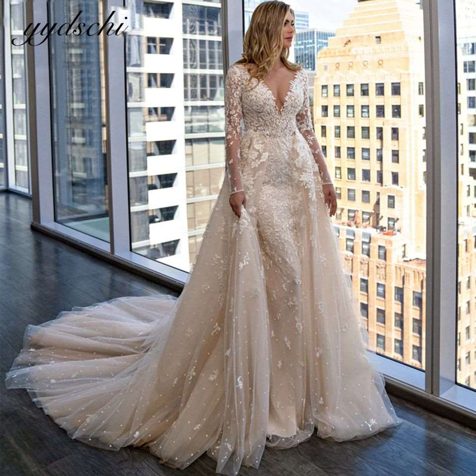 Abito da Sposa di lusso con coda staccabile e applicazioni di pizzo a forma di sirena, scollatura a V con maniche lunghe. - Bridetobe.it